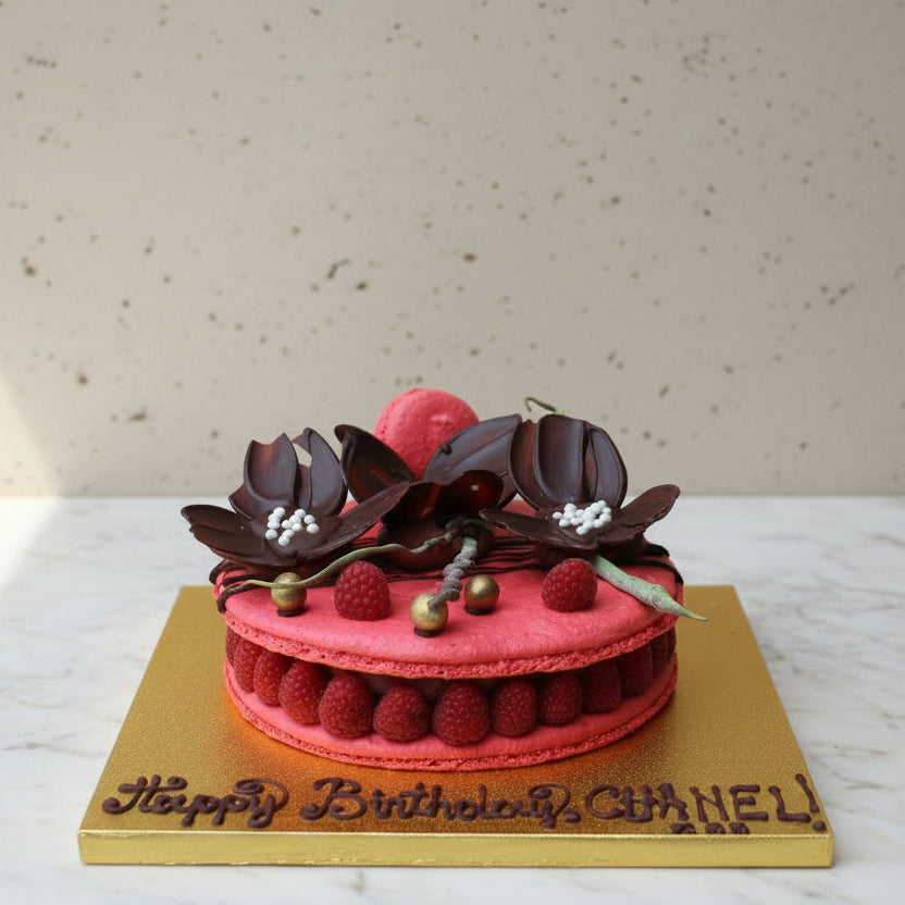 Giant chocolate and raspberry macaron birthday cake by Prestige Patisserie London
