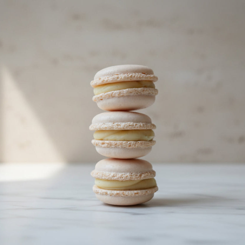Classic French macarons with vanilla cream filling taught in the French Macaron Masterclass at Prestige Patisserie London