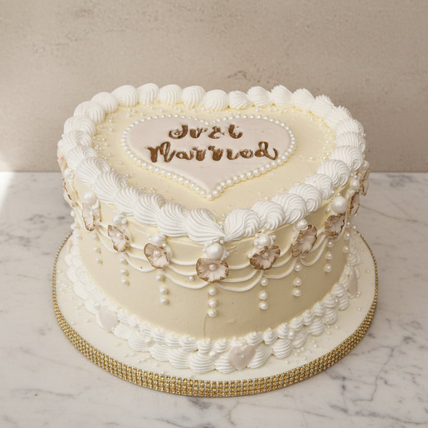 Wedding cake consultation with cake samples and Prosecco in North London bakery garden with head pastry chef Geanina