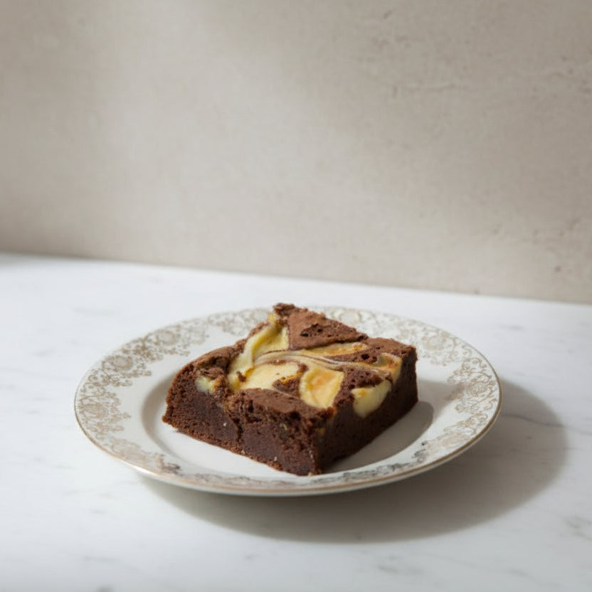 chocolate brownie with vanilla cheesecake swirl from Prestige Patisserie London