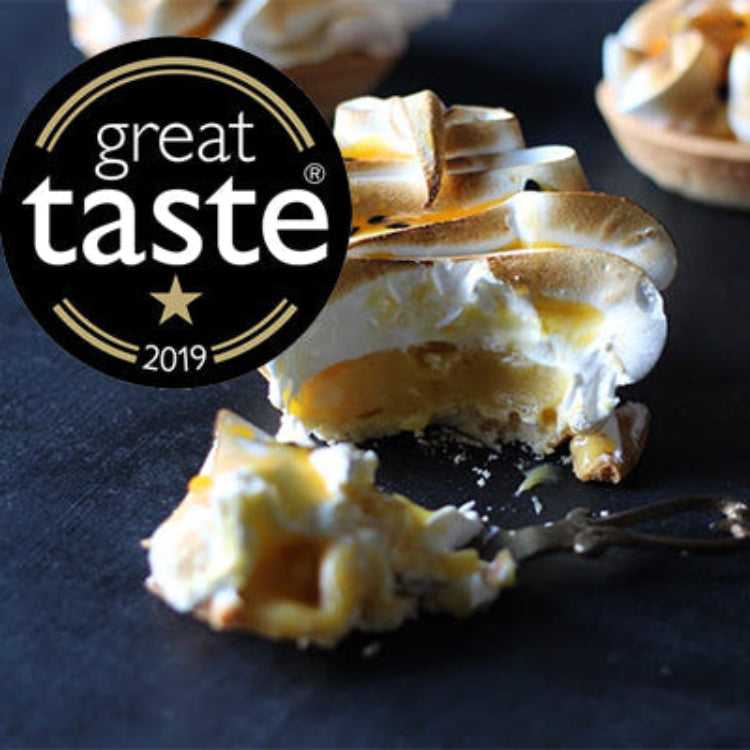 Award-winning Passion Fruit Meringue Tart topped soft Italian meringue