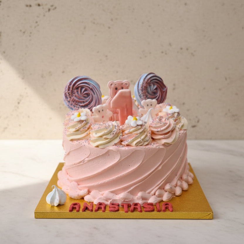 Custom baby celebration cake with pastel decorations, fondant baby toppers, and soft sponge layers, handmade in North London for showers or birthdays