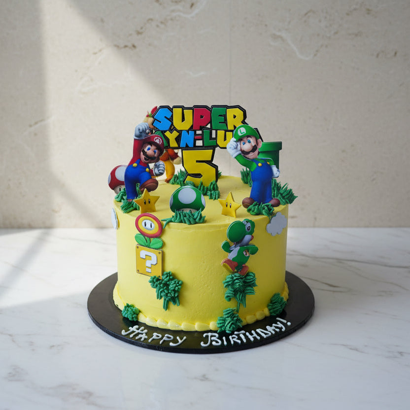 Super Mario themed birthday cake with Mario Luigi and Yoshi decorations handmade in London by Prestige Patisserie