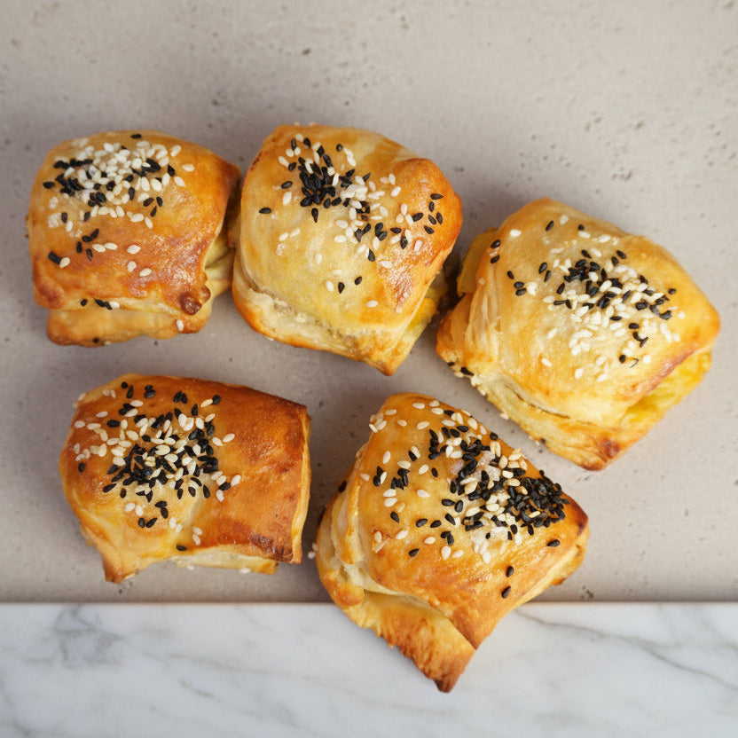 Chicken and leek puff pastry canapés luxury handmade savoury bites for catering events and corporate parties London