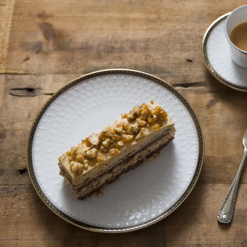 Flourless walnut coffee and chocolate cake with mousse and meringue layers, Great Taste Award winner, handcrafted in North London patisserie
