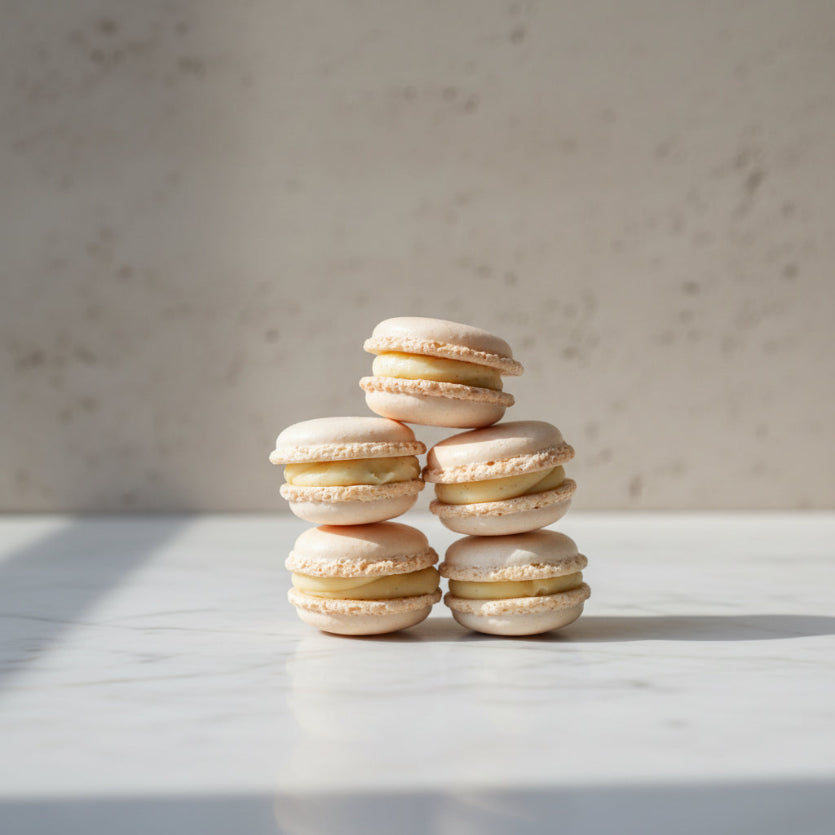 Classic French macarons with vanilla cream filling taught in the French Macaron Masterclass at Prestige Patisserie London