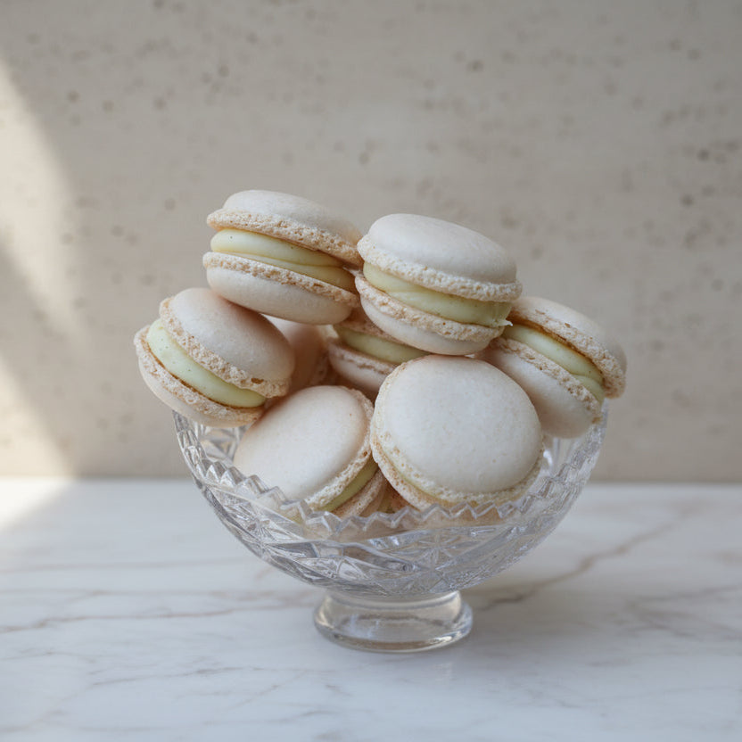 Classic French macarons with vanilla cream filling taught in the French Macaron Masterclass at Prestige Patisserie London
