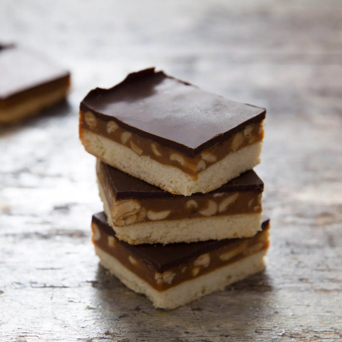 Peanut caramel shortbread with dark Belgian chocolate and sea salt