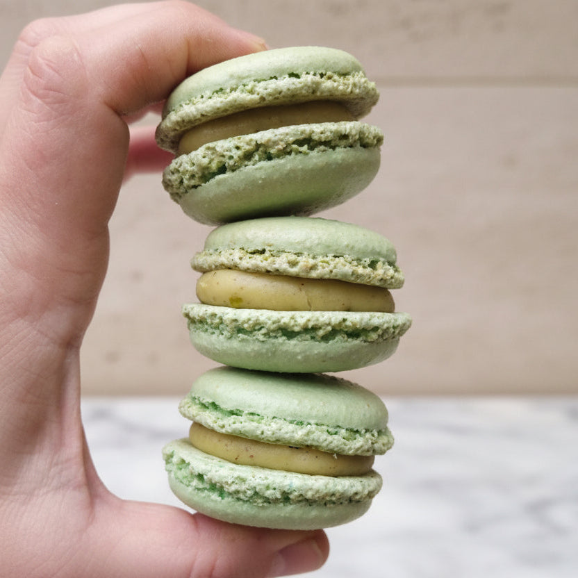 Luxury pistachio and rose French macaron canapés handmade in North London for weddings and corporate events