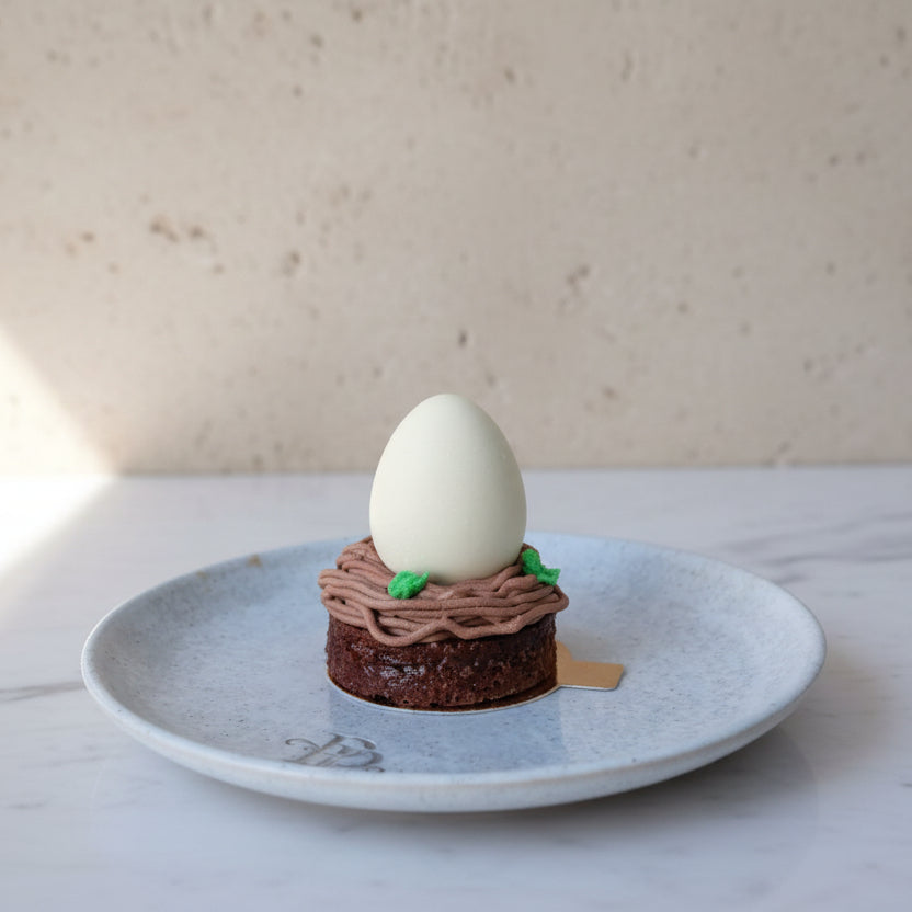 Chocolate Easter egg nest cakes with white chocolate eggs London bakery
