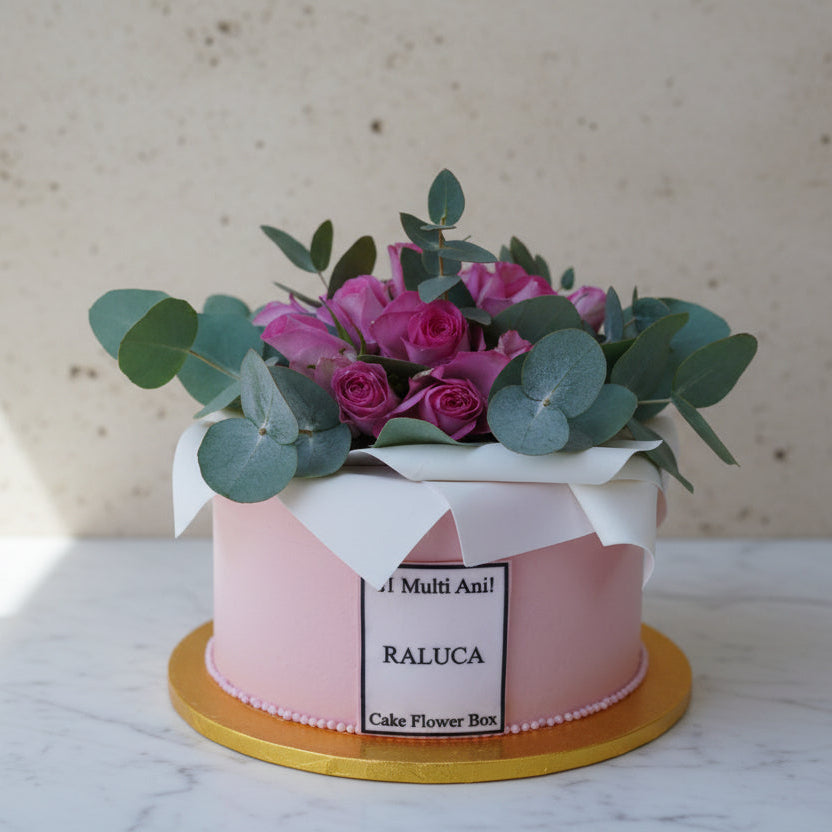 Large flower box cake with piped edible flowers in pink and cream tones, styled like a gift box, serves 30–35, handmade in North London patisserie