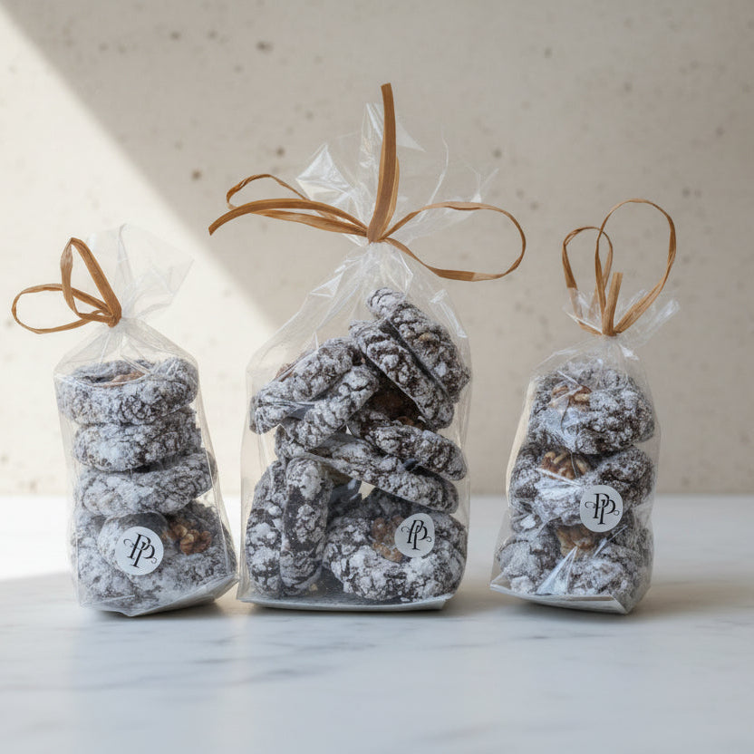 Flourless Walnetti cookies made with walnuts, cacao and egg, crisp and chewy, at a North London patisserie