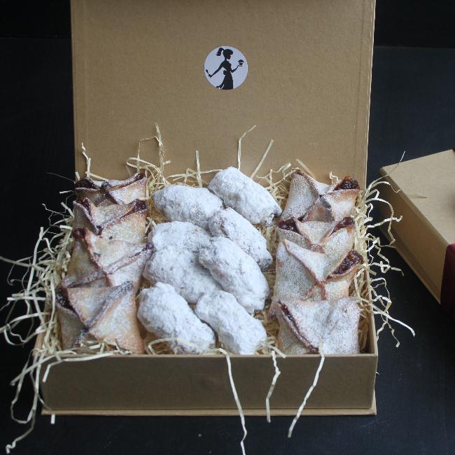 Handcrafted mini stollen and mince pies in an elegant Christmas gift box.