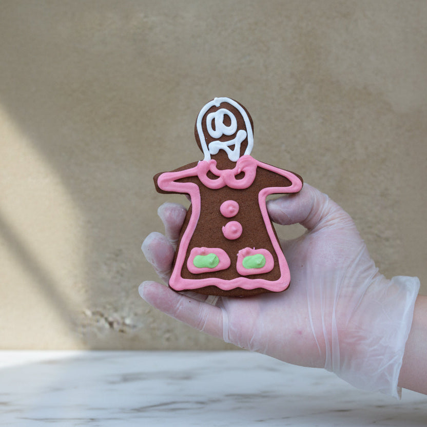 Gingerbread cookies shaped like George and Geanina