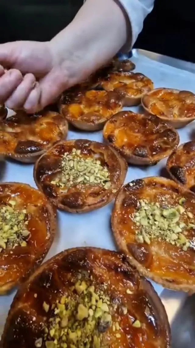 Apricot & Pistachio Frangipane Tarts  Golden apricots, rich frangipane, topped with pistachios, and buttery sweet pastry baked fresh in our North London kitchen.  Every tart is handmade from scratch, glazed while still warm, and finished for that perfect golden shine.
Available for collection from Prestige Patisserie.  #ApricotTart #PistachioFrangipane #FrangipaneTart #HandmadePastry #ArtisanBakery